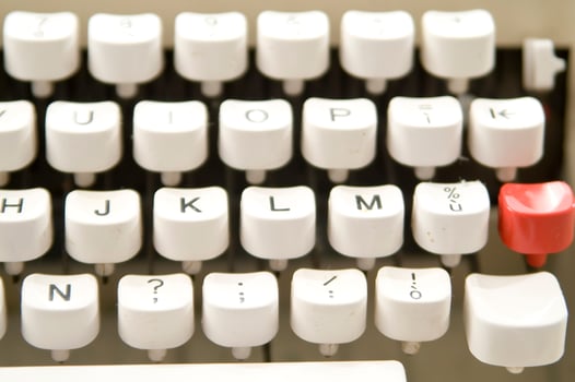 a close up of a typewriter keyboard with the letters oop photo