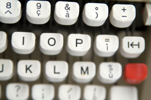 a close up of a typewriter keyboard with the letters oop photo