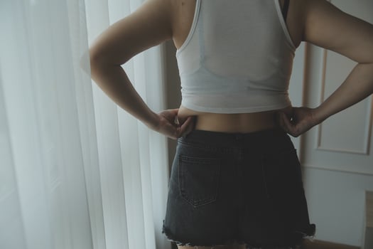 Fat woman measuring , fat woman fat belly chubby paunchy sport recreation health care lose belly fat do not exercise concept photo