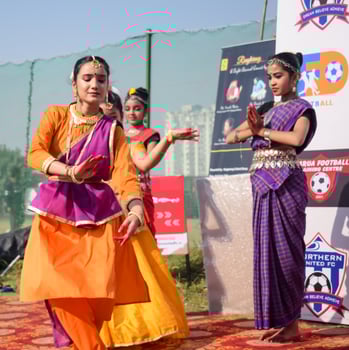 New Delhi, India - July 01 2023 - Bharathanatyam Indian classical odissi dancers performing at stage. Beautiful Indian girl dancers in the posture of Indian dance. Indian classical dance Bharatanatyam photo