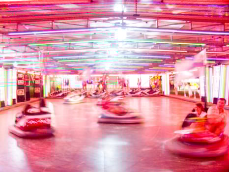 view of a funfair at night photo