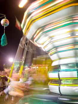 view of a funfair at night photo