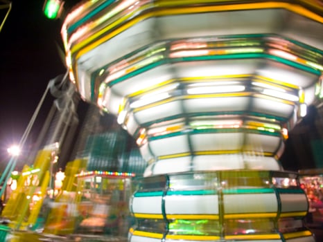 view of a funfair at night photo