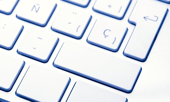 White keyboard background. Full frame photo