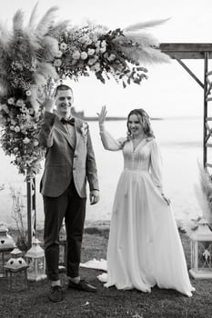wedding ceremony of the newlyweds in a country cottage photo