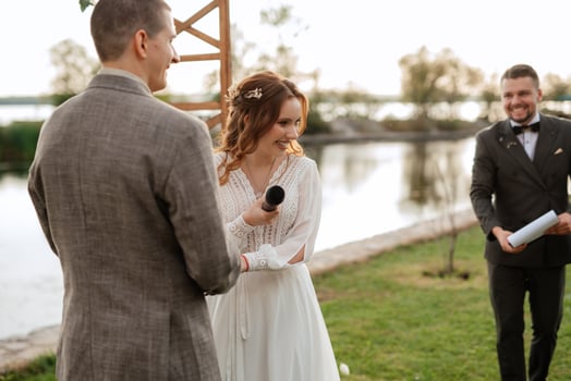 wedding ceremony of the newlyweds in a country cottage photo