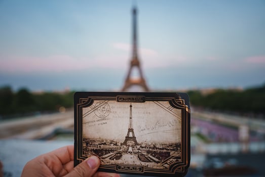Holding Eiffel Tower Photo in Paris