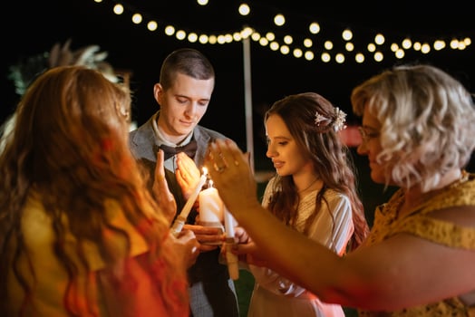 transfer of wedding fire with the help of candles the newlyweds photo