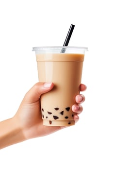 A hand holding takeaway plastic cup of delicious iced bubble milk tea and black pearls isolated on white background. ai generated photo