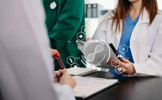 Medical technology network team meeting concept. Doctor hand working with smart phone modern digital tablet and laptop computer with graphics chart interface, with virtual icon photo