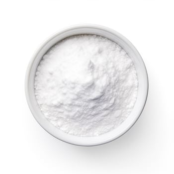 Baking soda top view isolated on white background photo