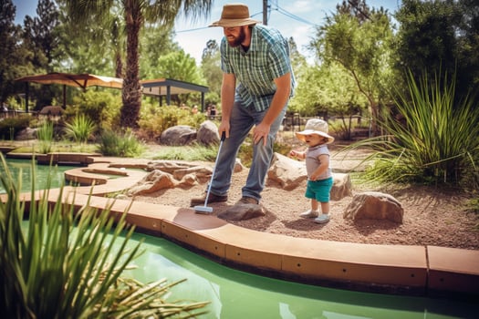 A family game of mini-golf on Fathers Day photo