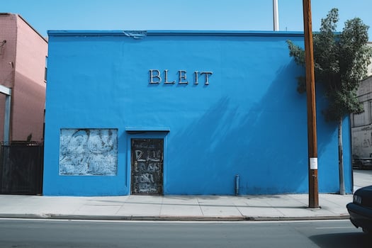 a blue wall with a large screen that saysblue photo