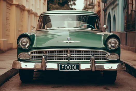 a green car with a license plate that saysfordon photo