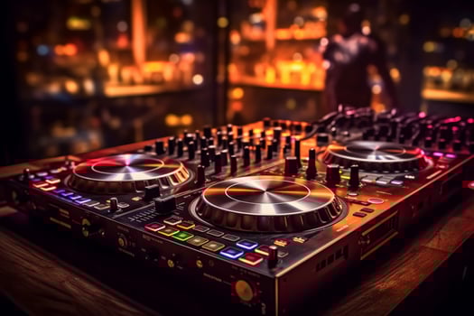 dj equipment in a club with a blurred background photo