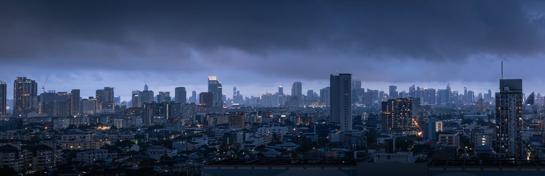 View city of Bangkok in Thailand before the storm in the twilight , rainy season thick clouds cover the town, global warming climate change concept photo