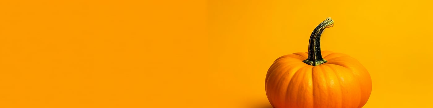 A pumpkin against a yellow background. Generative AI photo