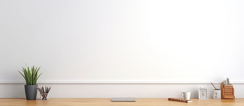 Copy space on white wall supplies on empty desk photo