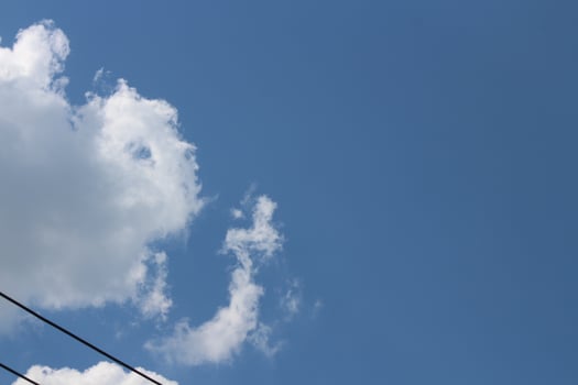 White clouds on the blue sky perfect for the background photo