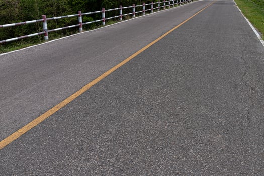 Asphalt road with marking lines white stripes texture Background. photo