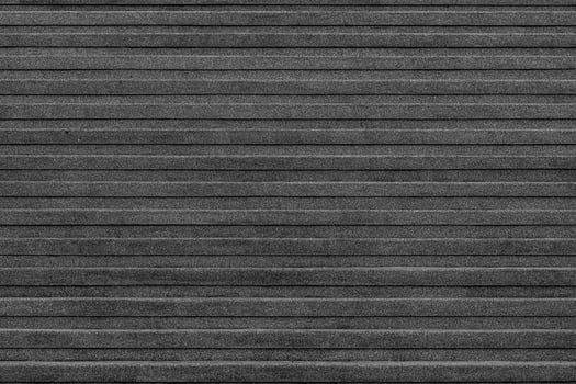 close-up corner of the outdoor marble staircase background texture of black stone stairs. photo