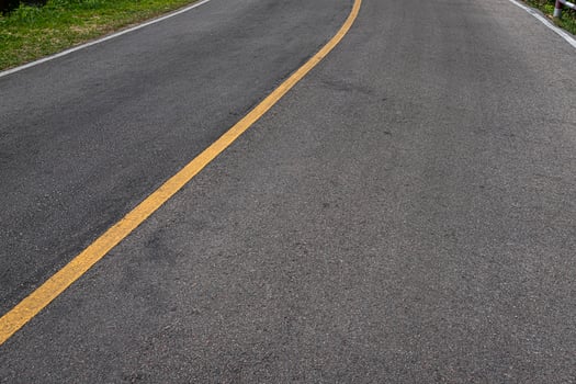Asphalt road with marking lines white stripes texture Background. photo