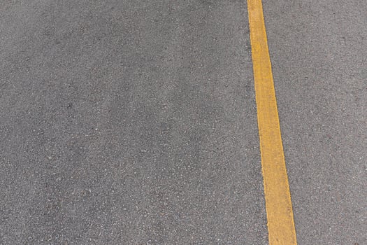 Asphalt road with marking lines white stripes texture Background. photo