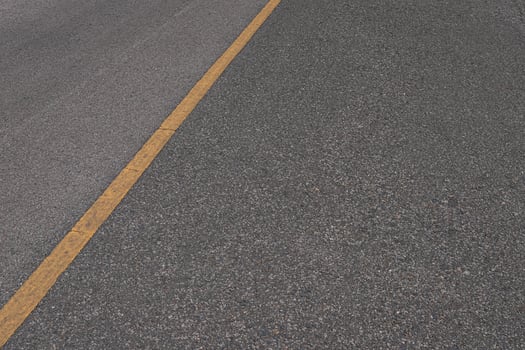 Asphalt road with marking lines white stripes texture Background. photo