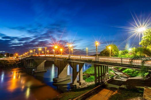 The color of Night traffic light on the road on the bridge Eka Thot Sa Root Bridge in Phitsanulok, Thailand. photo