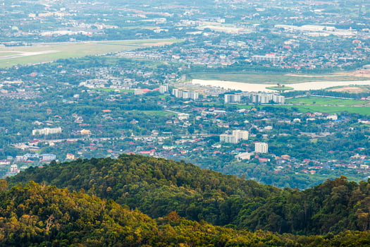 view in the mountains with cityscape over the city of Chiang Mai, Thailand at daytime. photo