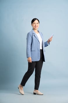 full body photo of a middle-aged businesswoman
