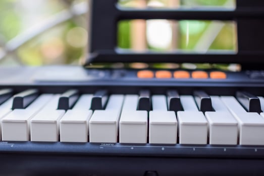 Close-up of piano keys. Piano black and white keys and Piano keyboard musical instrument placed at the home balcony during sunny day. photo