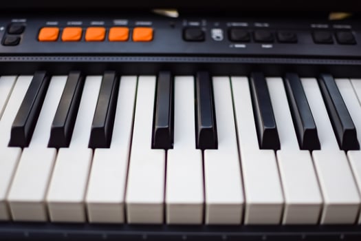 Close-up of piano keys. Piano black and white keys and Piano keyboard musical instrument placed at the home balcony during sunny day. photo