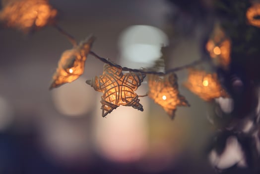 handmade white wicker star with light bulb for decorate photo