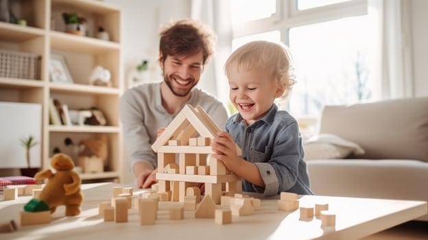Child plays with blocks photo