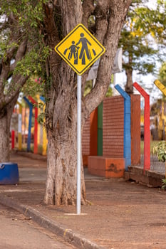 crosswalk warning yellow traffic sign photo