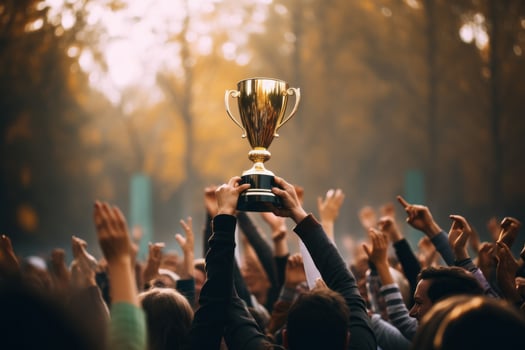 Business leader with winning cup photo