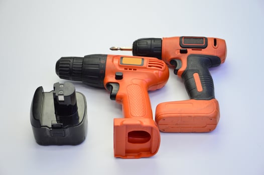 Electric screwdriver on a white background photo