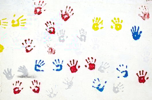 Hands on the white wall photo