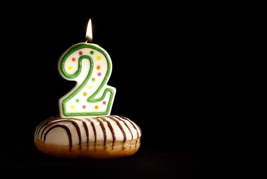 Candle with figure two. photo