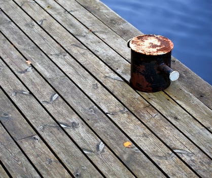 Rusty mooring ring photo