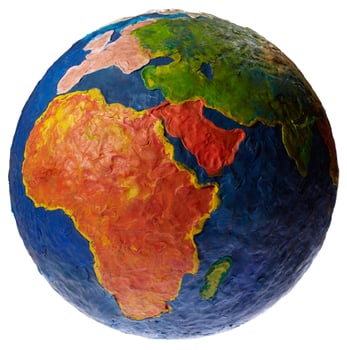 Plasticine globe isolated on white. photo