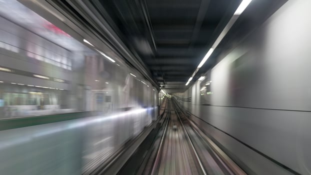 Moving subway train photo