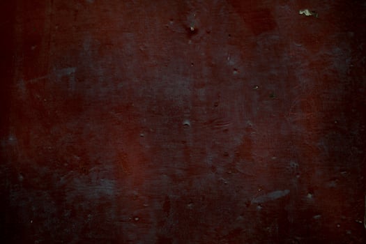 Old dark red rusty metal panel background texture photo