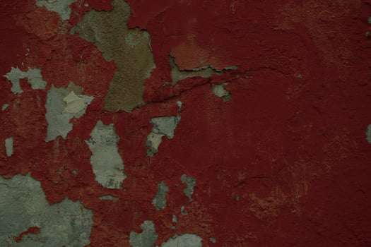 Background texture of old flaking red paint photo
