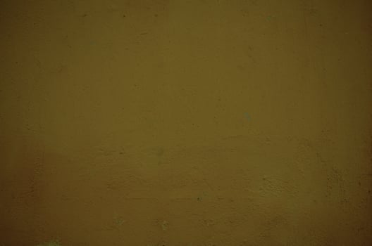 Vintage style old ochre painted grunge wall photo