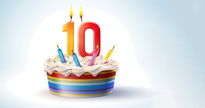 3d birthday cake with number 10 shapes candle on it photo