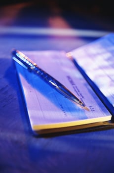 cheque with pen bank finance macro photo
