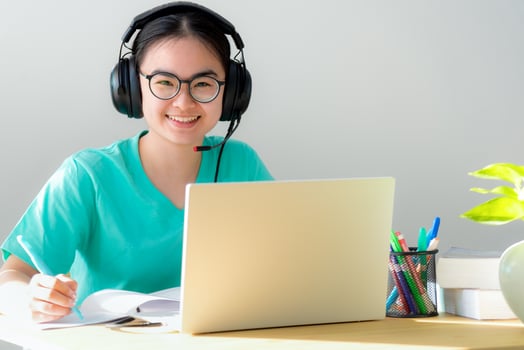 Asian young woman student smile and looking up photo