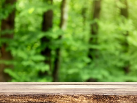 empty wooden tabletop podium in garden open forest, blurred green plants background with space. organic product presents natural placement pedestal display, spring and summer concept photo